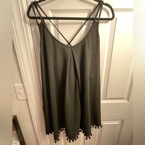 Black tank top with pom-poms